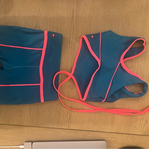 Tiger Friday : top is adult extra small and the bottom is child’s extra large. - Picture 2 of 2